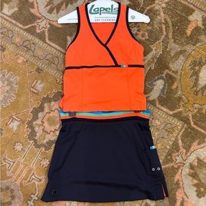 Tail Tech orange black tennis outfit with green and blue details size XS